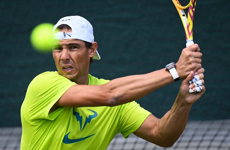 Spain's Rafael Nadal eyes the ball during a training session at the All England Club. AFP