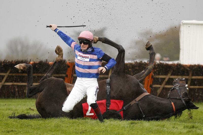 Sam Twiston-Davies riding Mont Des Avaloirs fall at the last when leading in The EBF Stallions National Hunt Novices' Hurdle Race at Wincanton racecourse in the United Kingdom. Alan Crowhurst / Getty Images