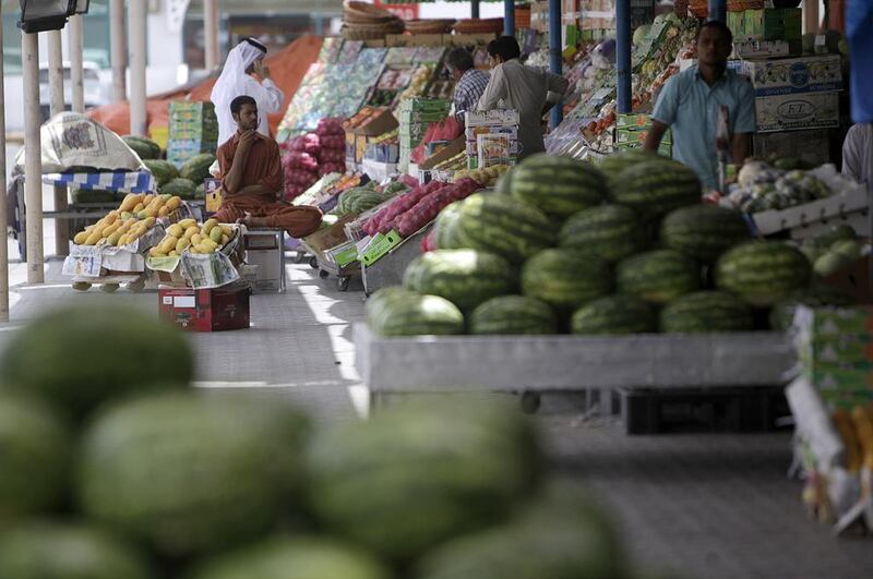 The fruit and vegetable market in Mina Zayed, Abu Dhabi, where produce is sold. Most of the UAE’s food supply is dependent on food imports from overseas. Sammy Dallal / The National