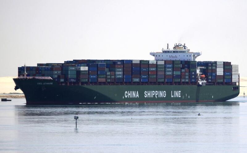A China Shipping Line container ship crosses the Suez Canal near the port city of Ismailia. Amr Abdallah Dalsh / Reuters