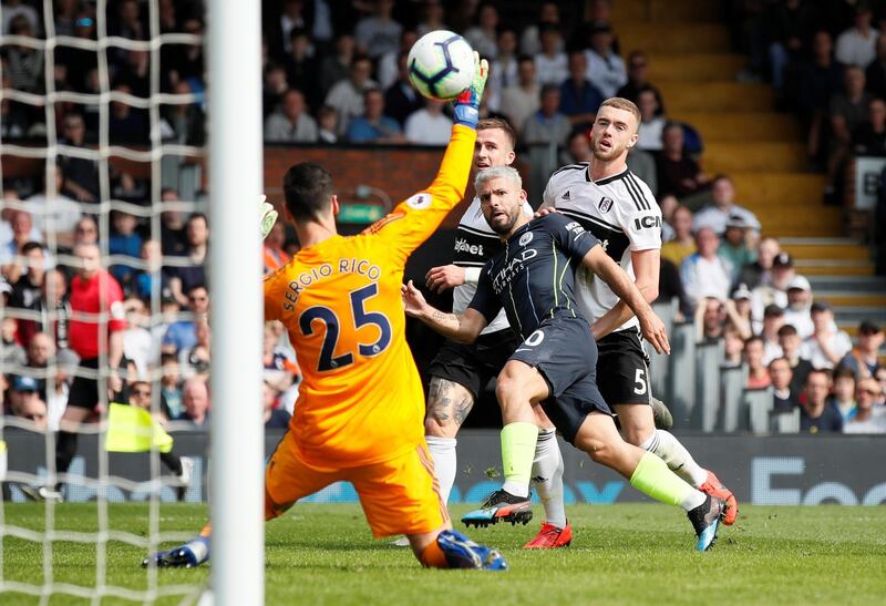 Manchester City's Sergio Aguero scores their second goal. Reuters