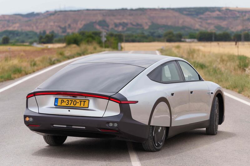 A photograph taken on June 21, 2022 shows the first solar car Lightyear O driving on a road during its world premiere presentation in Tudela, northern Spain.  - On June 9, 2022, the world's first long-range solar car Lightyear 0 was unveiled in an online global premiere.  (Photo by CESAR MANSO  /  AFP)