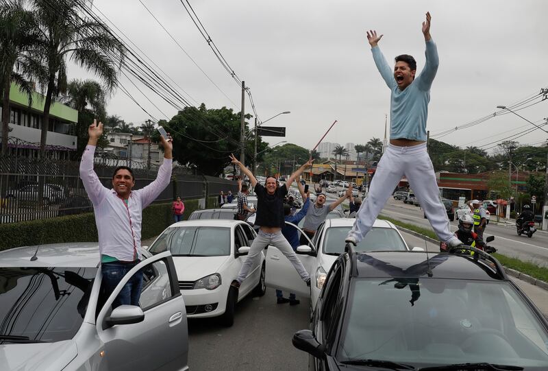 Uber drivers and of other ride-sharing apps, protest against proposed regulation of those services by the Brazilian Senate, in Sao Paulo, Brazil. Andre Penner / AP Photo