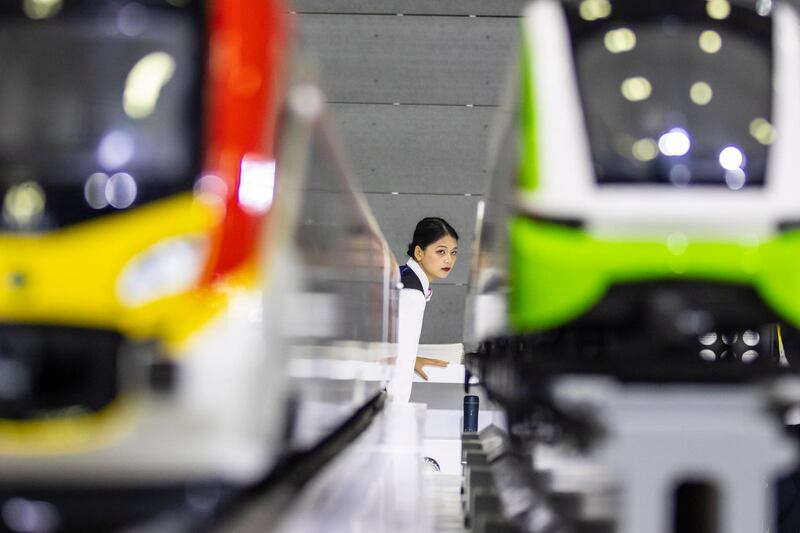 epa07961967 A woman passes the CRSC booth on the China International Rail Transit and Equipment Manufacturing Expo in Changsha, Hunan province, China, 18 October 2019 (issued 31 October 2019). China's manufacturing purchasing managers' index (PMI) foaled for sixth month in a row, according to official data released on 31 October. The ongoing contraction illustrates a worsening business climate, despite Beijing's efforts to spark economic growth. Media reports state that the October PMI was below expectations at 49.3 points from September at 49.8 and the lowest since hitting the 49.2 in February 2019.  EPA/ALEX PLAVEVSKI  ATTENTION: This Image is part of a PHOTO SET