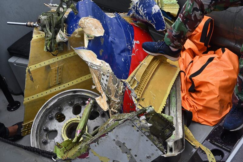 Retrieved wreckage from the ill-fated Sriwijaya Air Boeing 737-500 aircraft is seen during recovery operations near Lancang Island. AFP