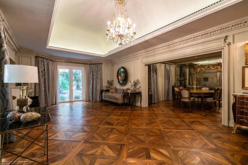 You can imagine a waltz or two taking place in this formal living room. Courtesy Luxury Property