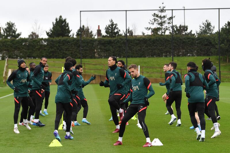 Liverpool's team players train on the eve of their Champions League quarter-final first leg against Benfica. AFP