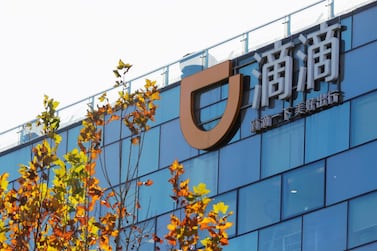 Didi Chuxing logo at its headquarters in Beijing. The ride-hailing company is pursuing plans to list its shares in the US. Reuters 