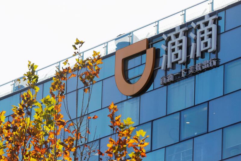 FILE PHOTO: A Didi logo is seen at the headquarters of Didi Chuxing in Beijing, China November 20, 2020. REUTERS/Florence Lo/File Photo