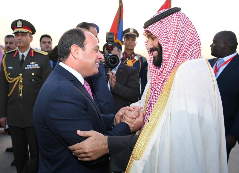 Egyptian President Abdel Fattah al-Sisi (L) welcomes Saudi Crown Prince Mohammad Bin Salman (R) at Cairo Airport, Egypt, March 4, 2018. in this handout picture courtesy of the Egyptian Presidency. The Egyptian Presidency/Handout via REUTERS ATTENTION EDITORS - THIS IMAGE WAS PROVIDED BY A THIRD PARTY