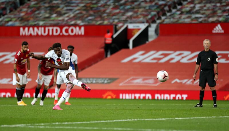 Crystal Palace's Wilfried Zaha scores from the spot. PA