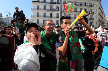 Algerian students protest in Algiers on Tuesday, one day after President Abdelaziz Bouteflika announced the withdrawal of his bid to run for a fifth term in office and the postponement of next month's elections. EPA
