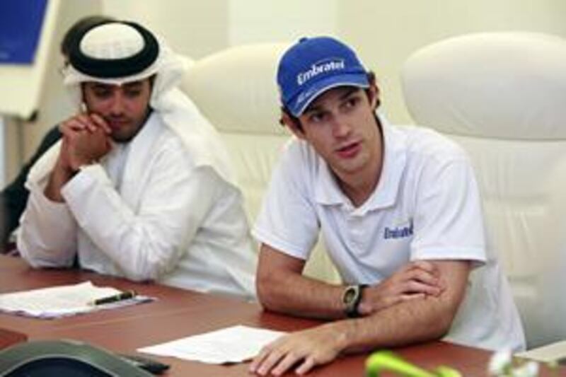 Hamed Al Harthi, the spokesman for the organisers ADMM, and Bruno Senna, the runner-up of the GP2 series last year, address the media during the announcement of the support races to the Abu Dhabi Grand Prix.