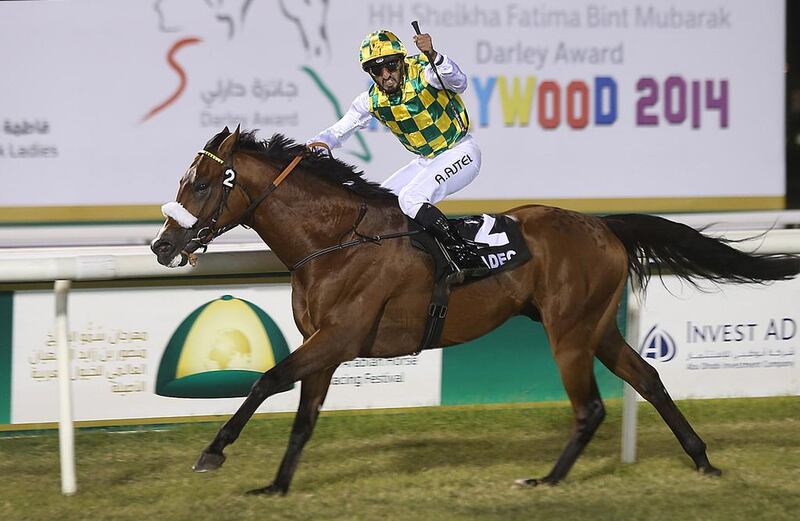 Emirati jockey Ahmed Ajtebi was aboard Areem when they won the UAE National Day Cup race on Sunday in Abu Dhabi. Delores Johnson / The National

