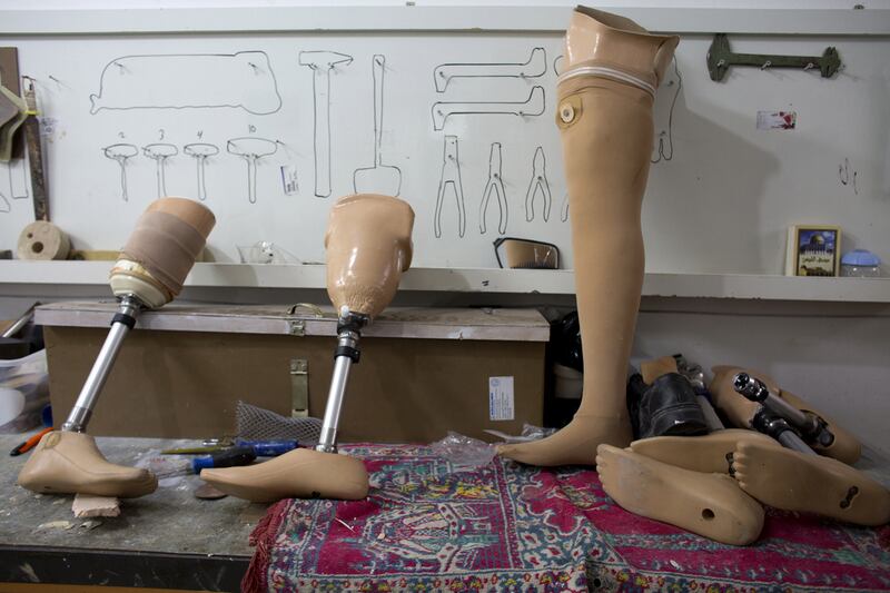 Prosthetics are seen on a table at the Artificial Limbs and Polio Center in Gaza City, Gaza , December11,2014. Many of the Palestinian’s wounded in last summer’s war between Israel and the Hamas-controlled Gaza Strip lost limbs. Heidi Levine for The National