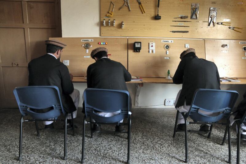 Former Taliban attend a religious lecture during their deradicalisation course at the Mishal centre in the Swat Valley. Florian Neuhof for The National