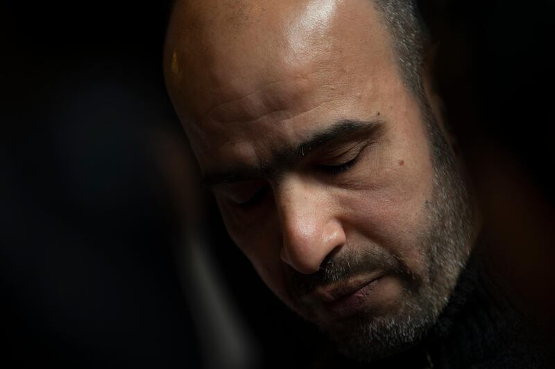 Dutch-Palestinian man Ismail Zeyada, originally from the Gaza Strip, pauses as he reads a statement after The Hague District Court, Netherlands, Wednesday, Jan. 29, 2020, threw out the case in which Zeyada sought to sue Benny Gantz, former Chief of Staff of the Israel Defense Forces, and another Israeli military commander over their roles in an air strike that killed six members of his family. (AP Photo/Peter Dejong)