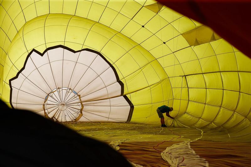 Balloonist Ton Rentier from The Netherlands prepares a hot air balloon at the start of the Hot Air Balloon festival at the Clark Global City, Mabalacat, Pampanga province, Philippines.  EPA
