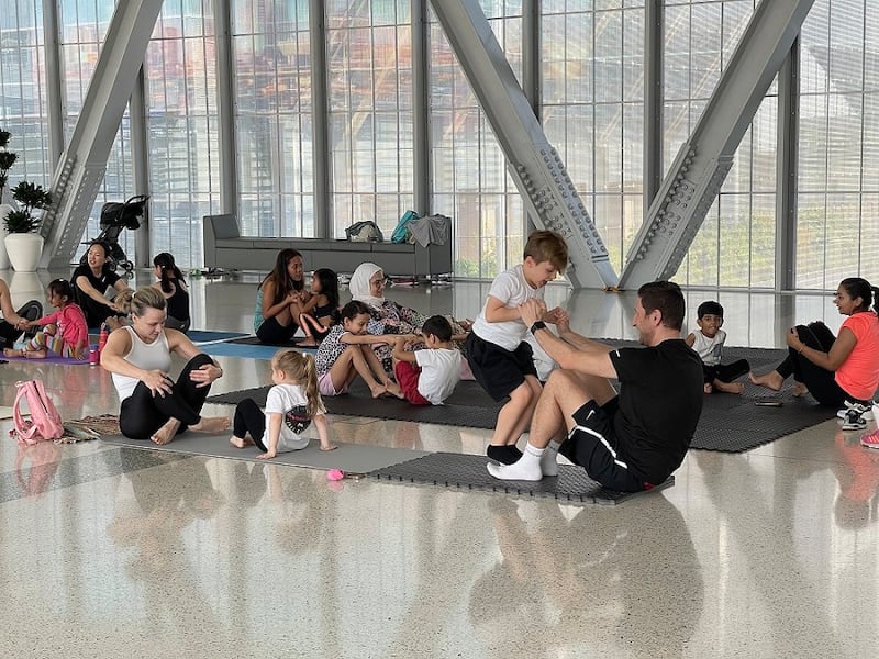 A parent-and-child yoga session at The Galleria mall in Abu Dhabi. Photo: Galleria Mall