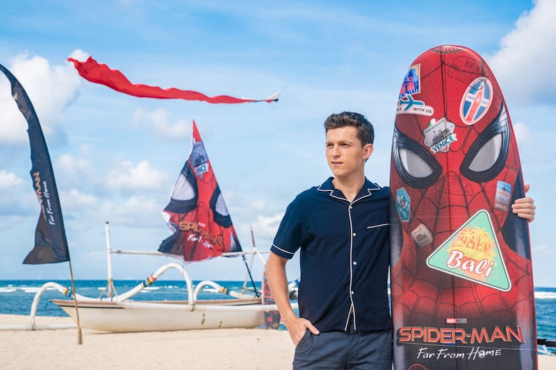 Tom Holland, in a navy bowling shirt, attends a for 'Spider-Man: Far From Home' photocall in Bali, Indonesia on May 28, 2019. Getty Images