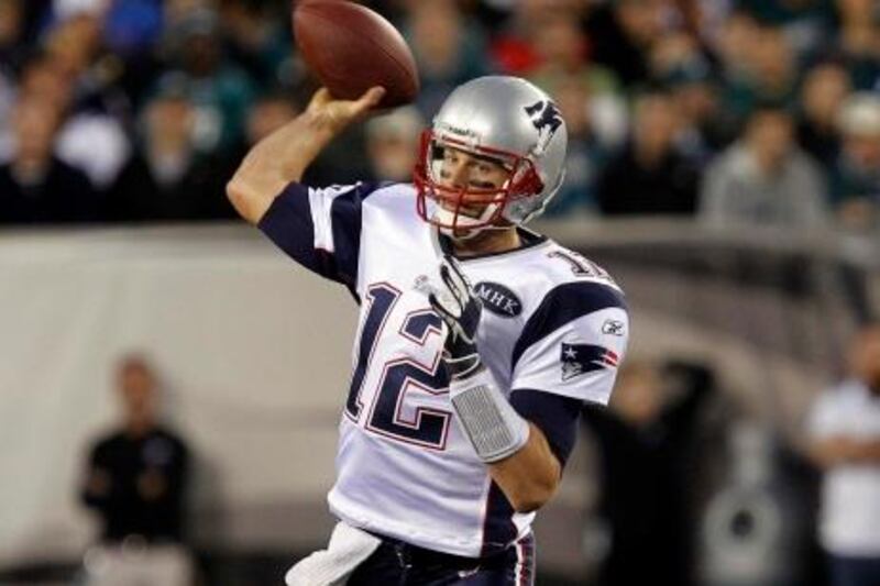 New England Patriots' quarterback Tom Brady throws a pass while playing against the Philadelphia Eagles during the first quarter of their NFL football game in Philadelphia, Pennsylvania, November 27, 2011. REUTERS/Tim Shaffer (UNITED STATES - Tags: SPORT FOOTBALL) *** Local Caption ***  PHL01_NFL-_1127_11.JPG