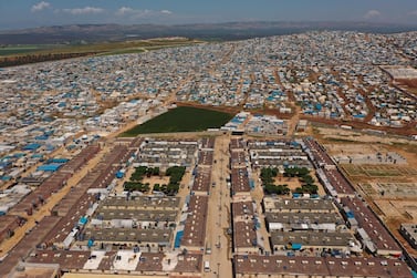 A large refugee camp on the Syrian side of the border with Turkey, near the town of Atma, in Idlib province, Syria. AP Photo