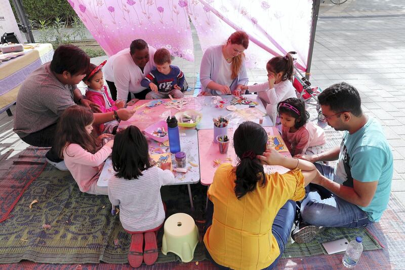 DUBAI , UNITED ARAB EMIRATES , January 18 – 2019 :- Kids playing at the Farmers Market held at the Bay Avenue in Business Bay in Dubai. (Pawan Singh / The National ) For News/Online/Instagram. Story by Patrick