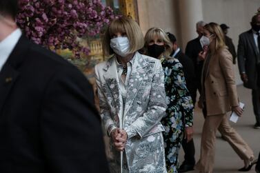 U. S.  first lady Jill Biden walks with Vogue editor-in-Chief Anna Wintour after the press preview of "In America: An Anthology of Fashion", ahead of the Met Gala Metropolitan Museum of Art in New York City, U. S.  May 2, 2022.   REUTERS / Shannon Stapleton