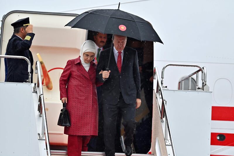 Turkish President Recep Tayyip Erdogan and his wife Emine Erdogan arrive. AFP