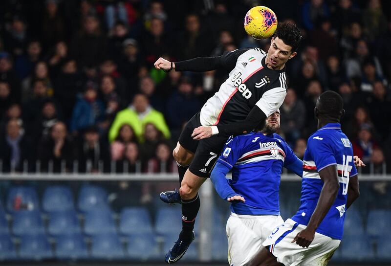 Ronaldo saors above the Sampdoria defence. AFP