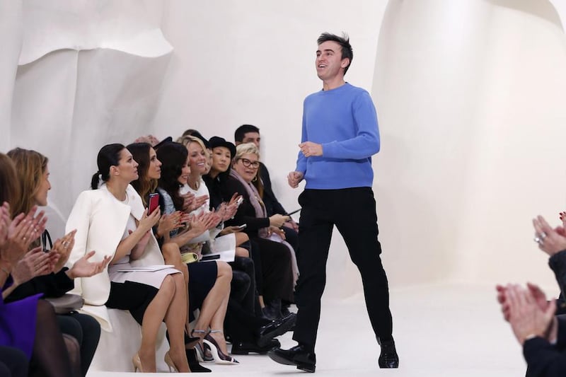 Belgian designer Raf Simons appears at the end of his Haute Couture Spring/Summer 2014 fashion collection for French fashion house Christian Dior. Reuters