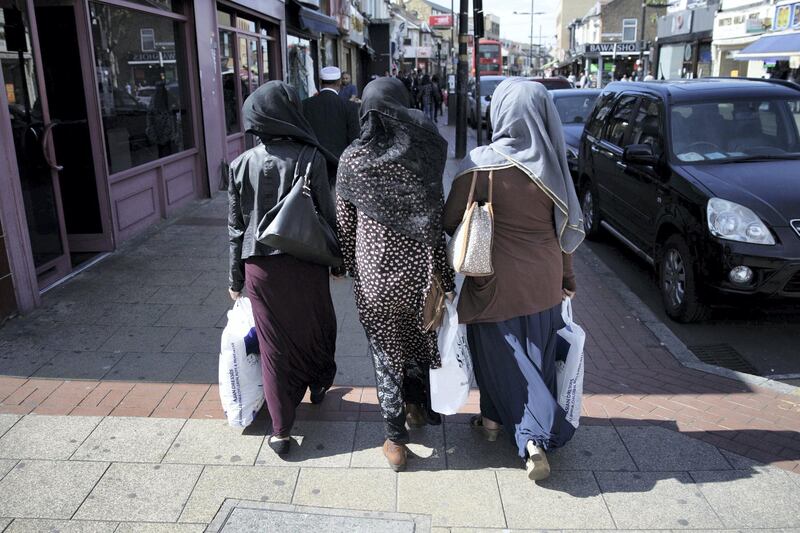 People shop at Upton Park, in London, Monday May 22, 2017. ‚ÄúMainstream fashion is now talking about modest fashion as a thing. Ten years ago, if you were a brand coming from a religious background and tried to sell it in department stores, calling it a modest or Muslim brand would be a kiss of death,‚Äù said Reina Lewis, a professor at the London College of Fashion who has written two books about the topic. While the majority of those interested in covered-up fashion are young, cosmopolitan Muslim women, ‚Äúthe term ‚Äòmodesty‚Äô emerged in the niche market as a useful one because it‚Äôs not faith-specific,‚Äù Lewis added. (AP Photo/Tim Ireland)