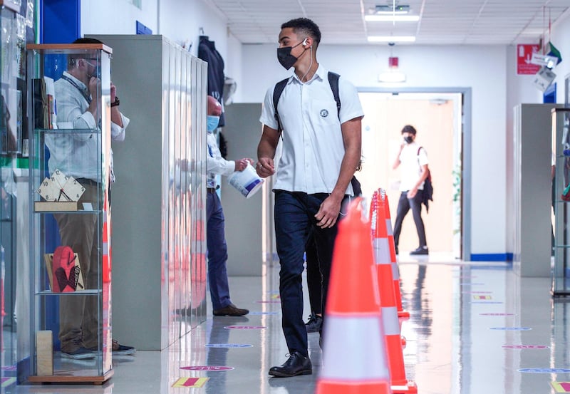 Abu Dhabi, United Arab Emirates, September 28, 2020.  First day back to classes on the reopening of British School Al Khubayrat, with Covid-19 protocols for the safety of  students, faculty and parents.  Victor Besa/The NationalSection:  NAReporter:  Haneen Dajani