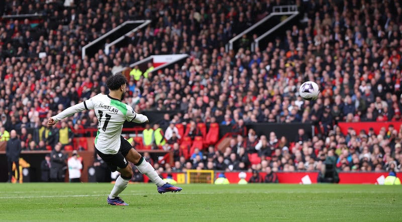 Liverpool's Mohamed Salah shoots against Manchester United. EPA