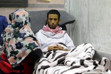 Saudi solider Moussa Awji waits to board the aircraft before flying out of the Sanaa airport on Tuesday. EPA