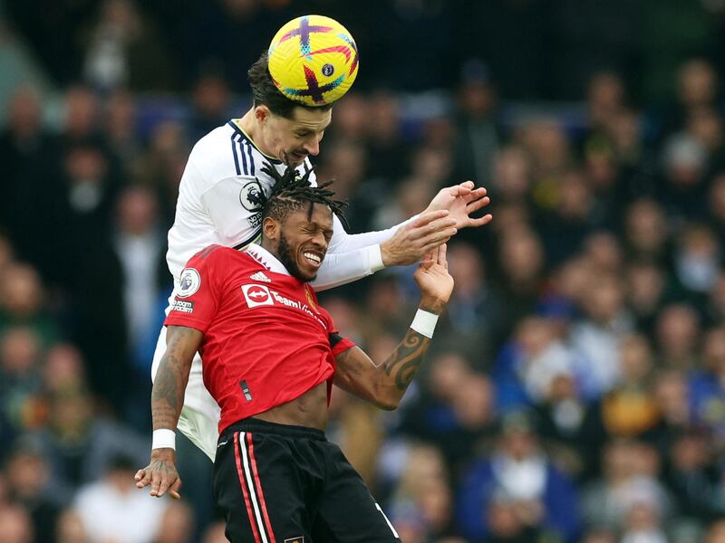 Leeds United's Robin Koch in action with Manchester United's Fred. Reuters