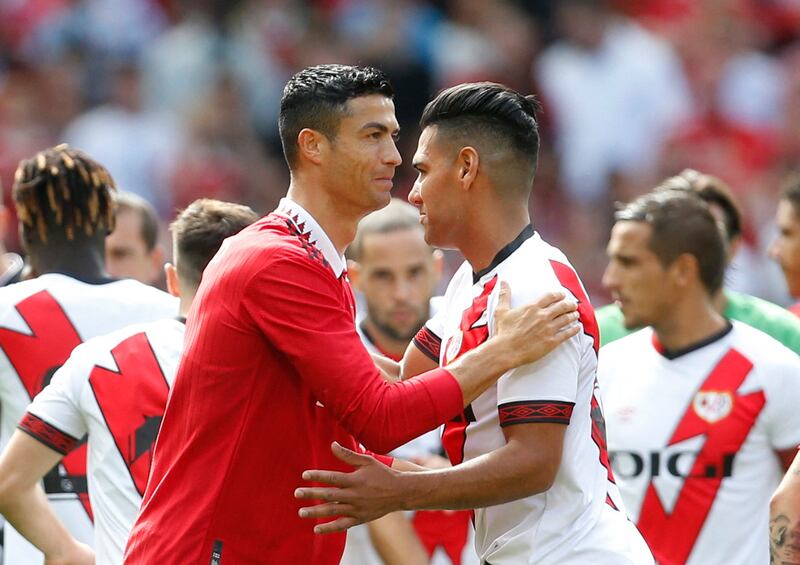Manchester United's Cristiano Ronaldo and Rayo Vallecano's Radamel Falcao greet before the match at Old Trafford. Reuters
