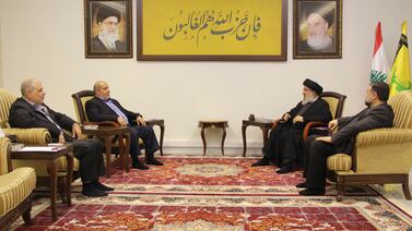 Hezbollah leader Hassan Nasrallah, second right, meets senior Hamas official Khalil Al Hayya, second left, in Beirut, on Wednesday. AP