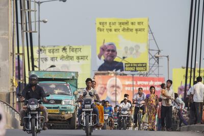 Election posters for Prime Minister Narendra Modi’s BJP line a street in Patna, Bihar state. Bloomberg
