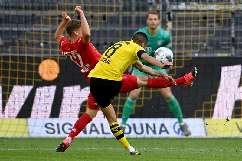 Dortmund's German midfielder Mahmoud Dahoud shoots. AFP