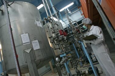 An Iranian technician works at the Isfahan Uranium Conversion Facilities in 2007. Tehran says it has breached the limitation set on its low-enriched uranium by the nuclear deal in 2015. AFP