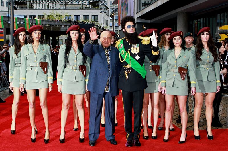 Mr Al-Fayed with Sacha Baron Cohen, dressed as his alter-ego Admiral General Aladeen, attending the premiere of The Dictator in London in 2012. Getty Images