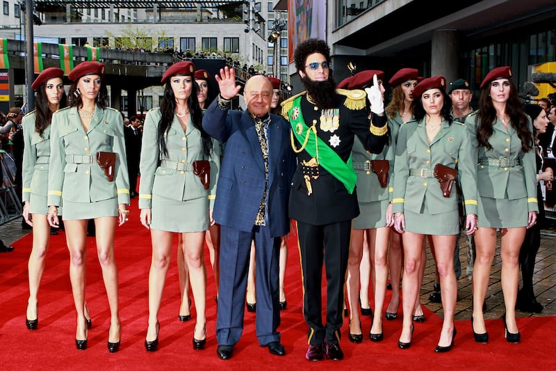 Mr Al-Fayed with Sacha Baron Cohen, dressed as his alter-ego Admiral General Aladeen, attending the premiere of The Dictator in London in 2012. Getty Images