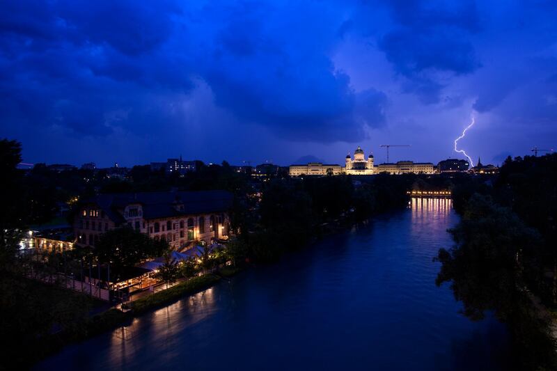Lightning illuminates the sky during a thunderstorm in Berne, Switzerland. Anthony Anex / EPA