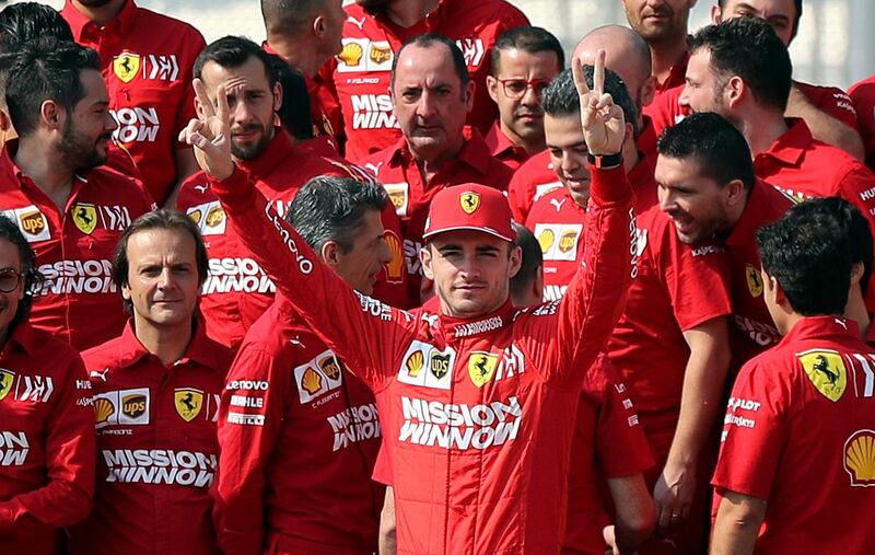 Charles Leclerc prepares for the end season team picture. AP