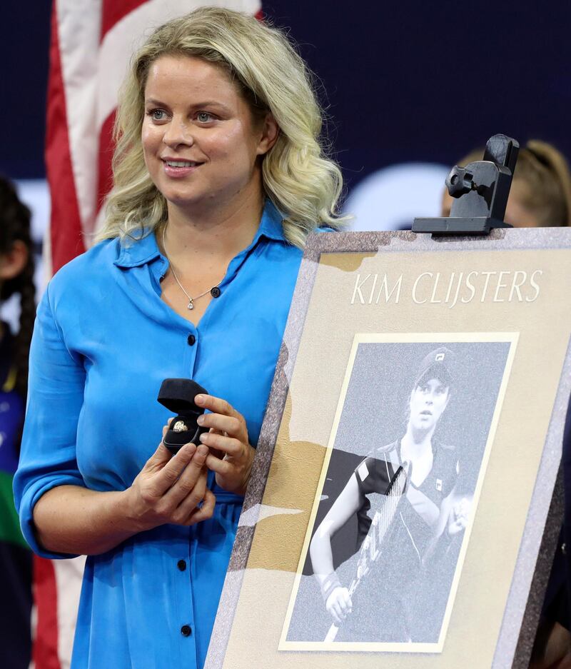 Former Belgian tennis player and US Open champion Kim Clijsters is honoured with a plaque in Arthur Ashe Stadium before the start of the Catherine McNally versus Serena Williams match. EPA