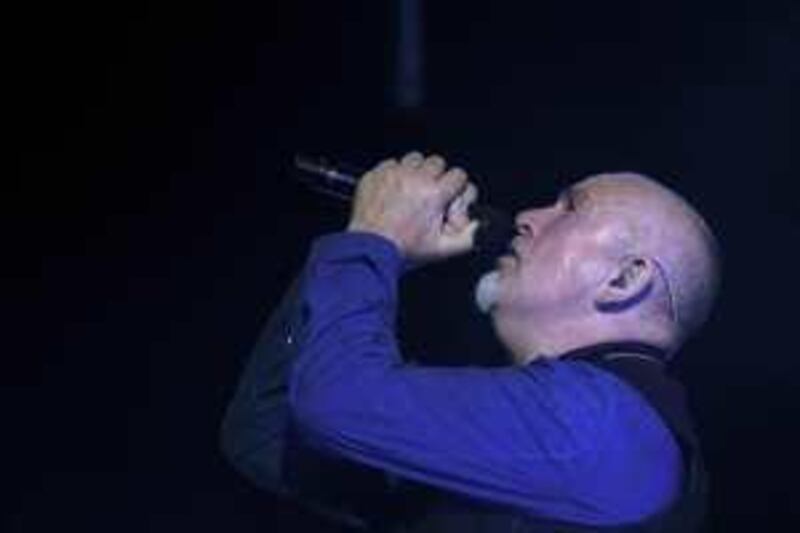 British musician Peter Gabriel performs in concert in a stadium in Caracas, the first one of his South American tour on March 18, 2009.  AFP PHOTO / THOMAS COEX