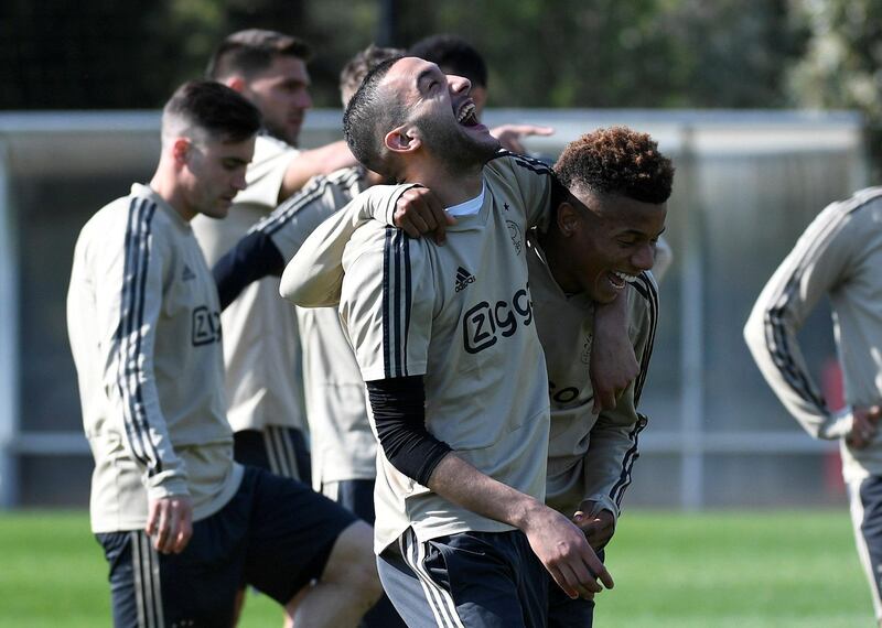 Soccer Football - Champions League - Ajax Amsterdam Training - Sportcomplex de Toekomst, Amsterdam, Netherlands - April 9, 2019   Ajax Amsterdam's Hakim Ziyech and David Neres during training   REUTERS/Piroschka Van De Wouw