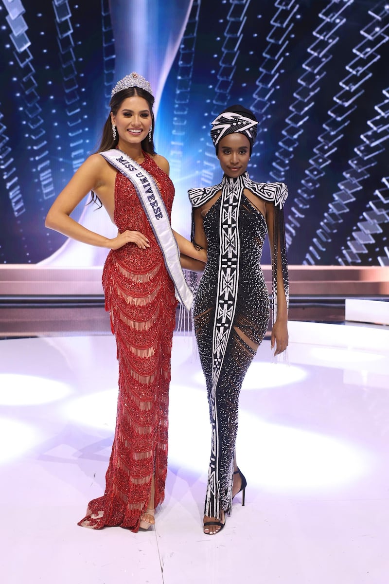 Miss Universe 2020 Andrea Mesa and Miss Universe 2019 Zozibini Tunzi pose onstage at the Miss Universe 2020 Pageant at Seminole Hard Rock Hotel & Casino on May 16, 2021 in Hollywood, Florida. AFP