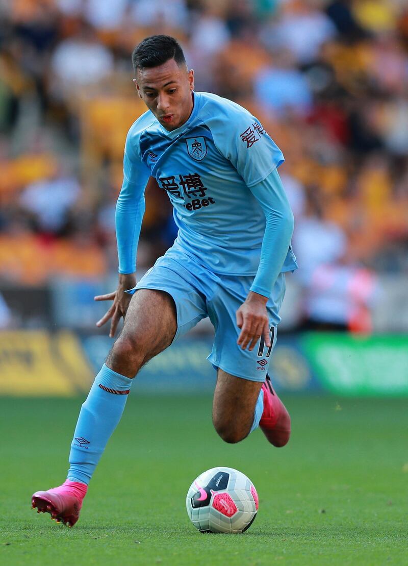WOLVERHAMPTON, ENGLAND - AUGUST 25:  Dwight McNeil of Burnley runs with the ball during the Premier League match between Wolverhampton Wanderers and Burnley FC at Molineux on August 25, 2019 in Wolverhampton, United Kingdom. (Photo by David Rogers/Getty Images)
